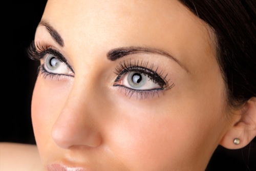 portrait of young beautiful attractive womans face, nose and eyes looking up-img-blog